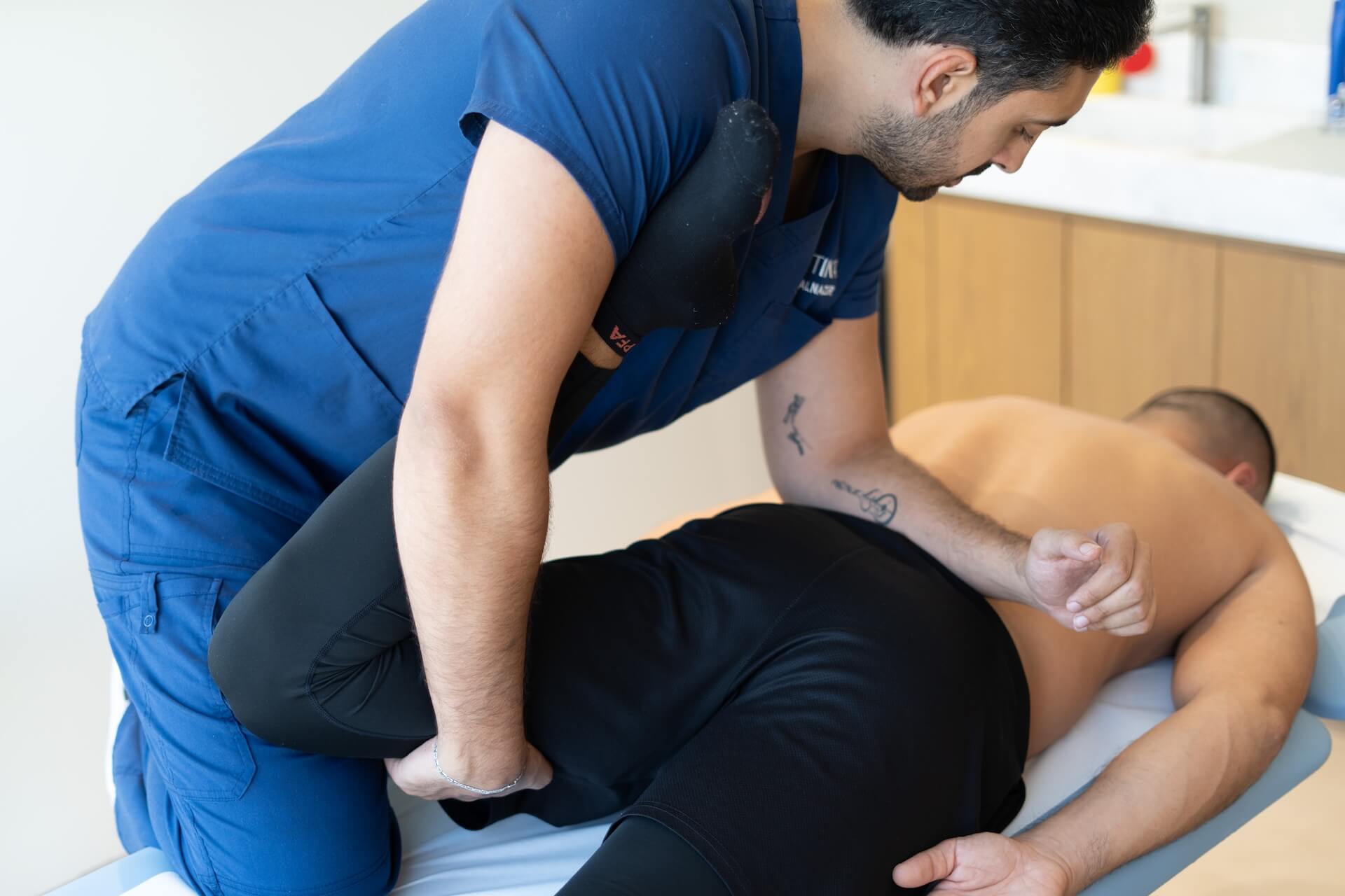 KINETIKA physiotherapist performing osteopathic manual therapy