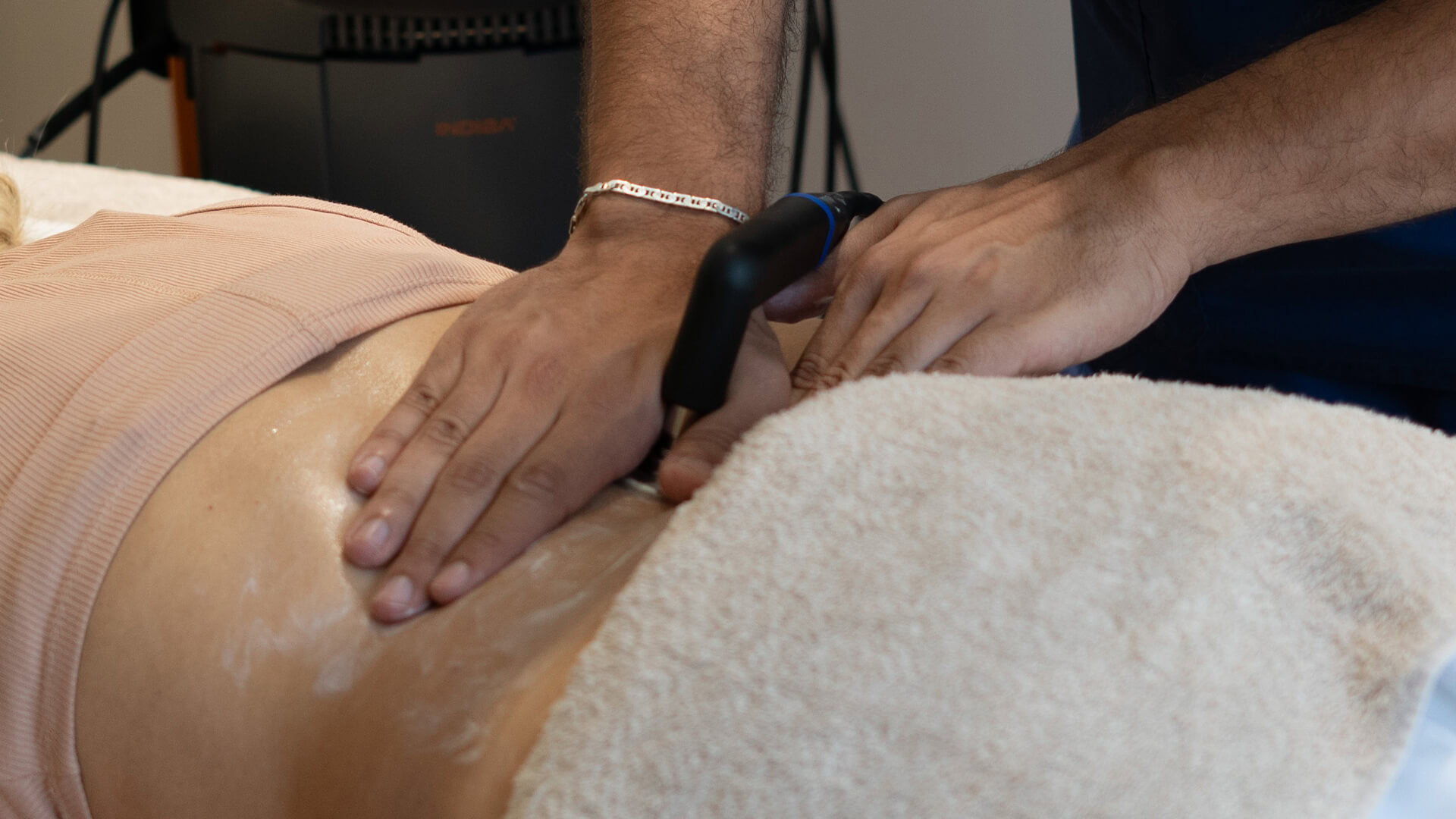 KINETIKA therapist performing TECAR therapy on patient